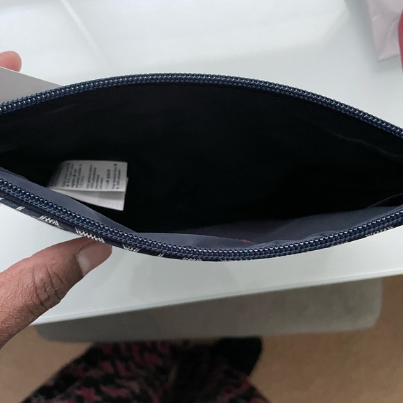 - Tommy Hilfiger wrist bag